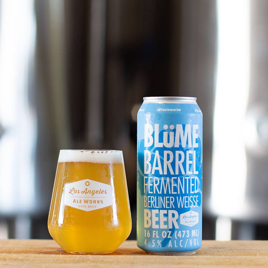 Blume Barrel Fermented Berliner Weisse beer in wine style glass next to can