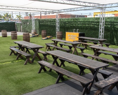 Outdoor Private Event Space with barrels and tables
