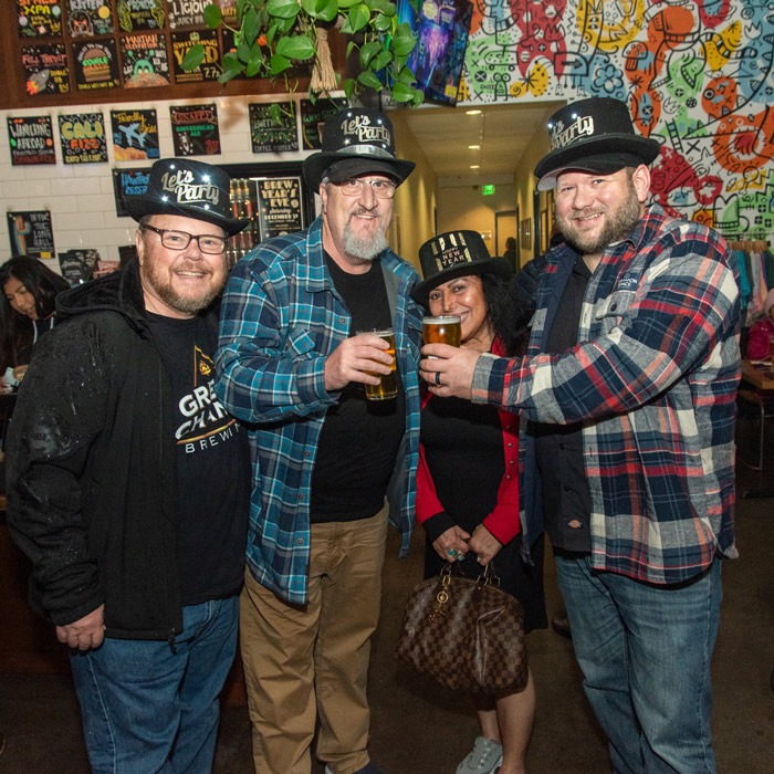 Group of people toasting at New Years Eve celebration
