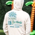 Zip up cream colored hoodie with LA Ale Works artwork printed on back